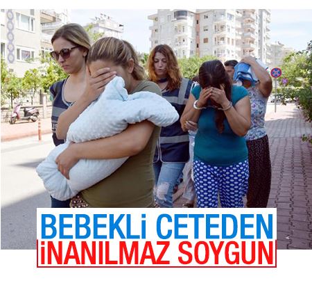 Antalya'da kucağındaki bebekle servet değerinde soygun